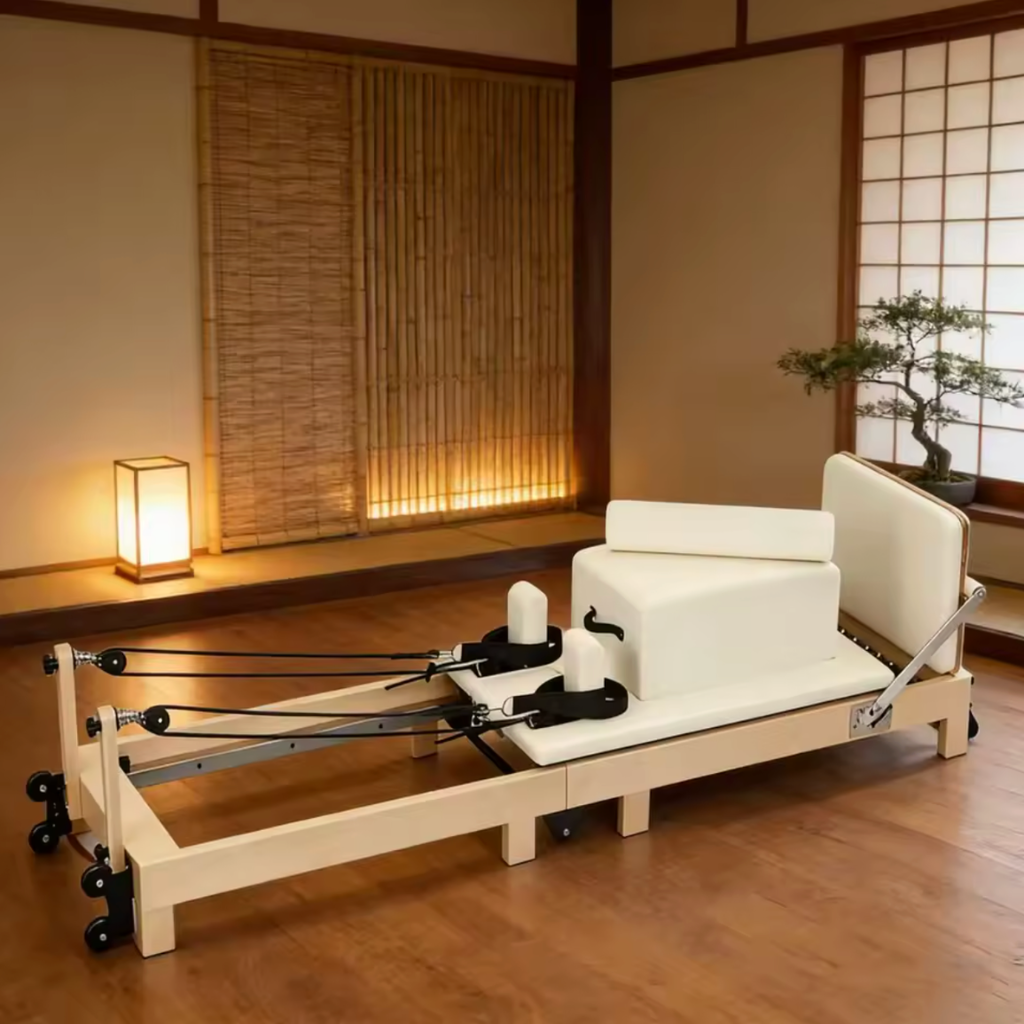 Pilates reformer pliable en bois